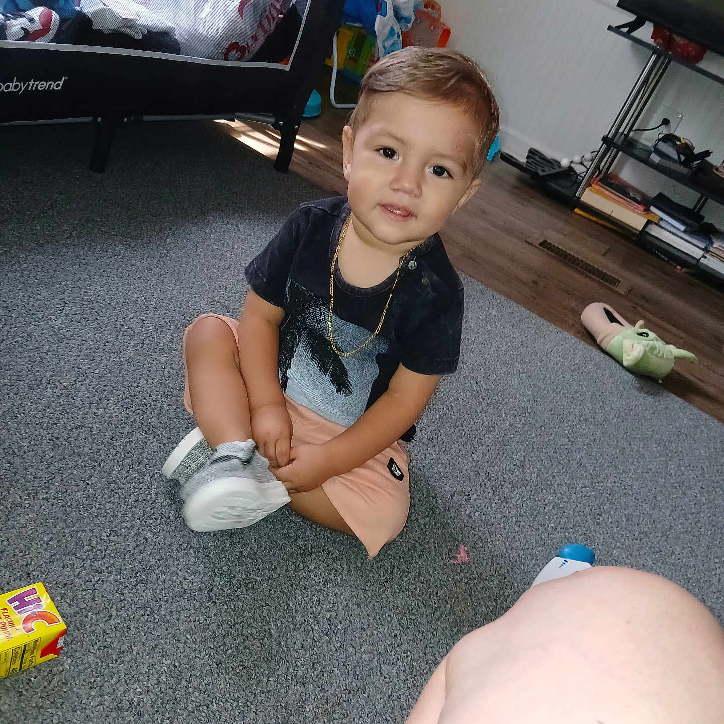 Isaias is registered to the contest to win money with this photo: accessories, boy, child, clothing, computerhardware, electronics, face, footwear, hardware, head, male, monitor, person, photography, portrait, screen, shoe, shorts, sitting, tv