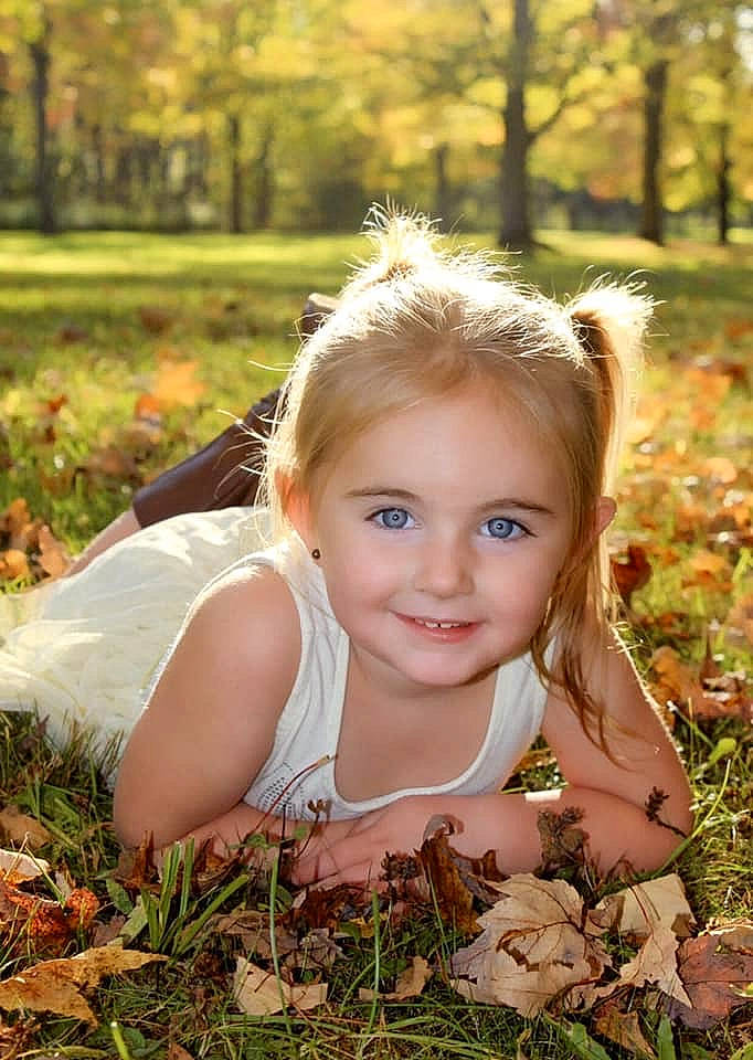 Kynsleigh is registered to the contest to win money with this photo: autumn, beauty, blond, child, child_model, facial_expression, grass, hair, happy, head, joy, leaf, people_in_nature, person, photograph, photography, portrait, smile, sunlight, toddler