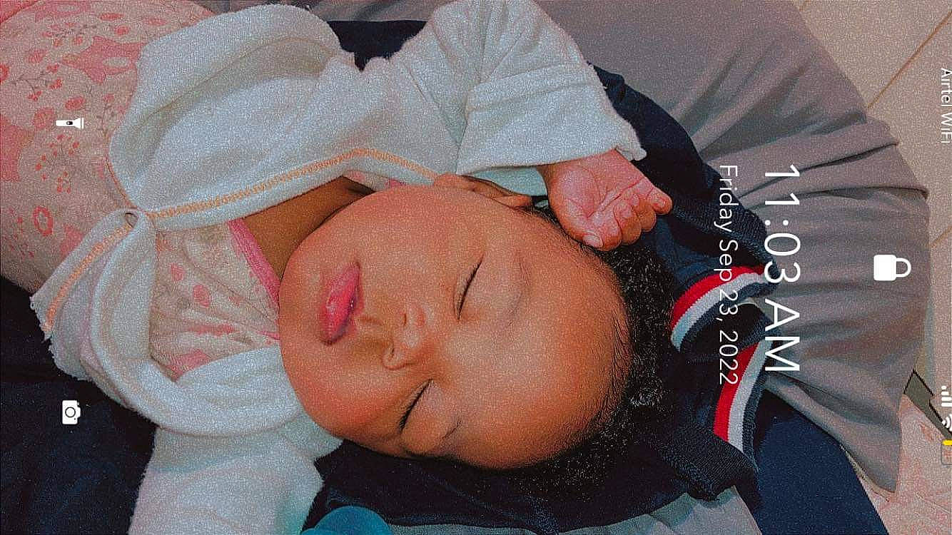 Leanni is registered to the contest to win money with this photo: baby, baby_products, baby_sleeping, baby_toddler_clothing, bedtime, cheek, child, comfort, linens, nap, pattern, peach, person, room, sleep, sleeve, textile, toddler