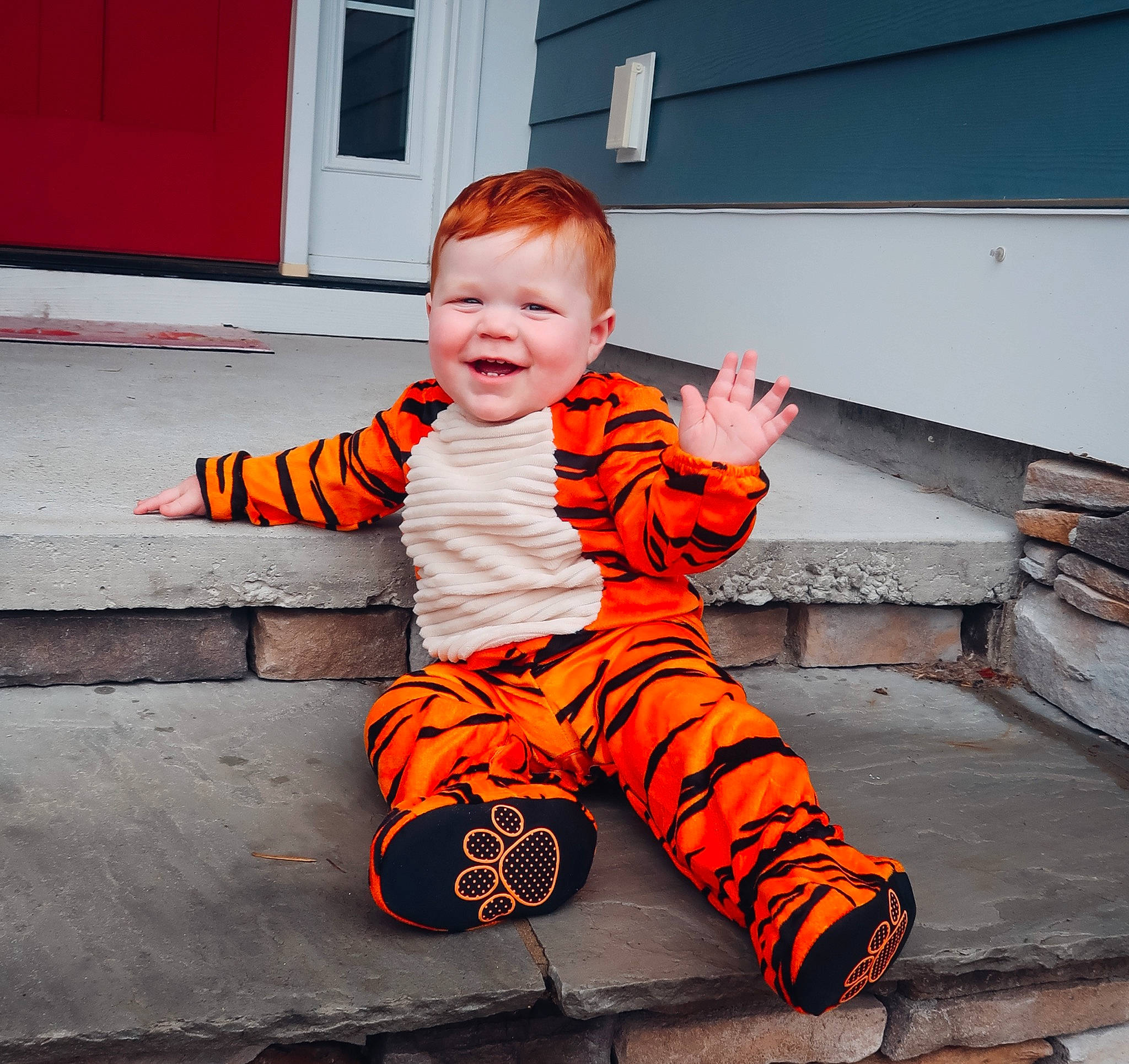Bryant is registered to the contest to win money with this photo: asphalt, baby, baby_toddler_clothing, child, door, flooring, fun, happy, joy, orange, pattern, people_in_nature, person, portrait_photography, sitting, sleeve, smile, toddler, wood