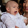 baby, infant, woman, smile, yawn, white_clothing, lace, portrait, indoor, person, holding, cute, happy, face, skin, head, family, love, people, closeup