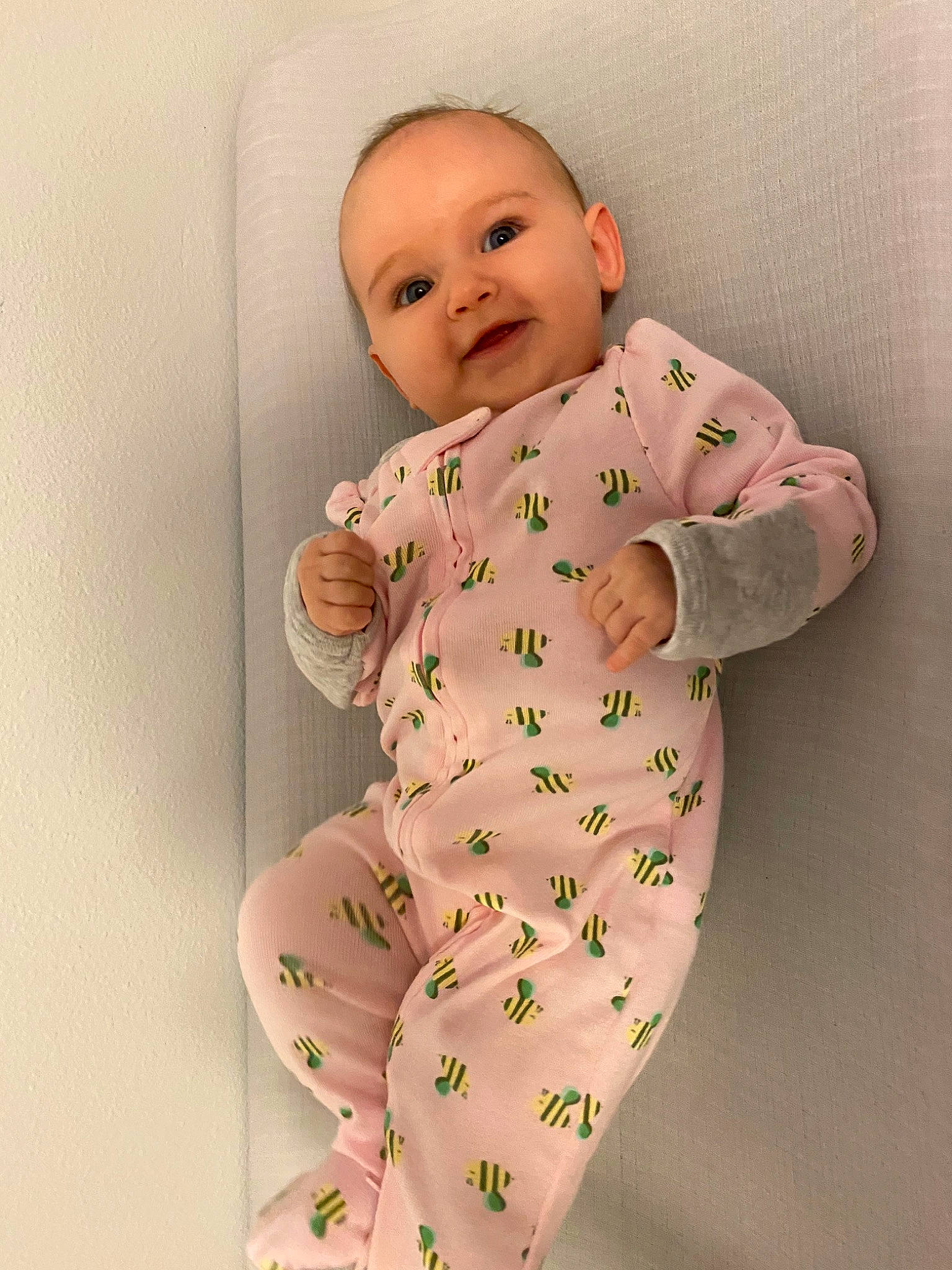 Marlie is registered to the contest to win money with this photo: baby, baby_products, baby_sleeping, baby_toddler_clothing, child, infant_bodysuit, pajamas, person, pink, product, skin, sleeve, toddler