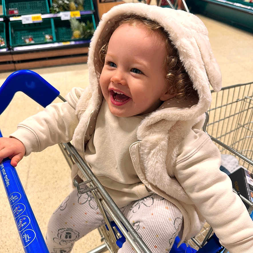 Miley-mae joined the competition — help win amazing prizes! adult, baby, bicycle, bodypart, cap, clothing, face, female, finger, hand, hat, head, hood, person, photography, portrait, shoppingcart, transportation, vehicle, woman