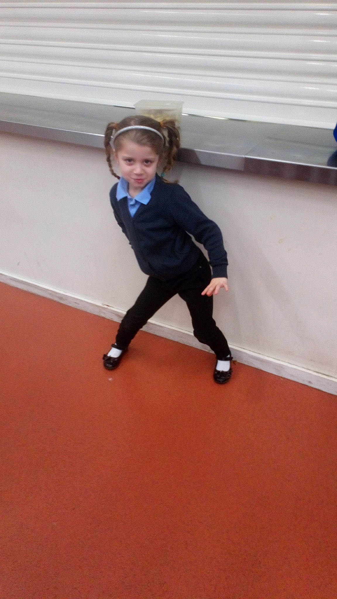 Alexis is registered to the contest to win money with this photo: arm, child, clothing, day, floor, flooring, footwear, fun, girl, hip, joint, leg, person, physical_exercise, physical_fitness, play, recreation, shoe, shoulder, standing