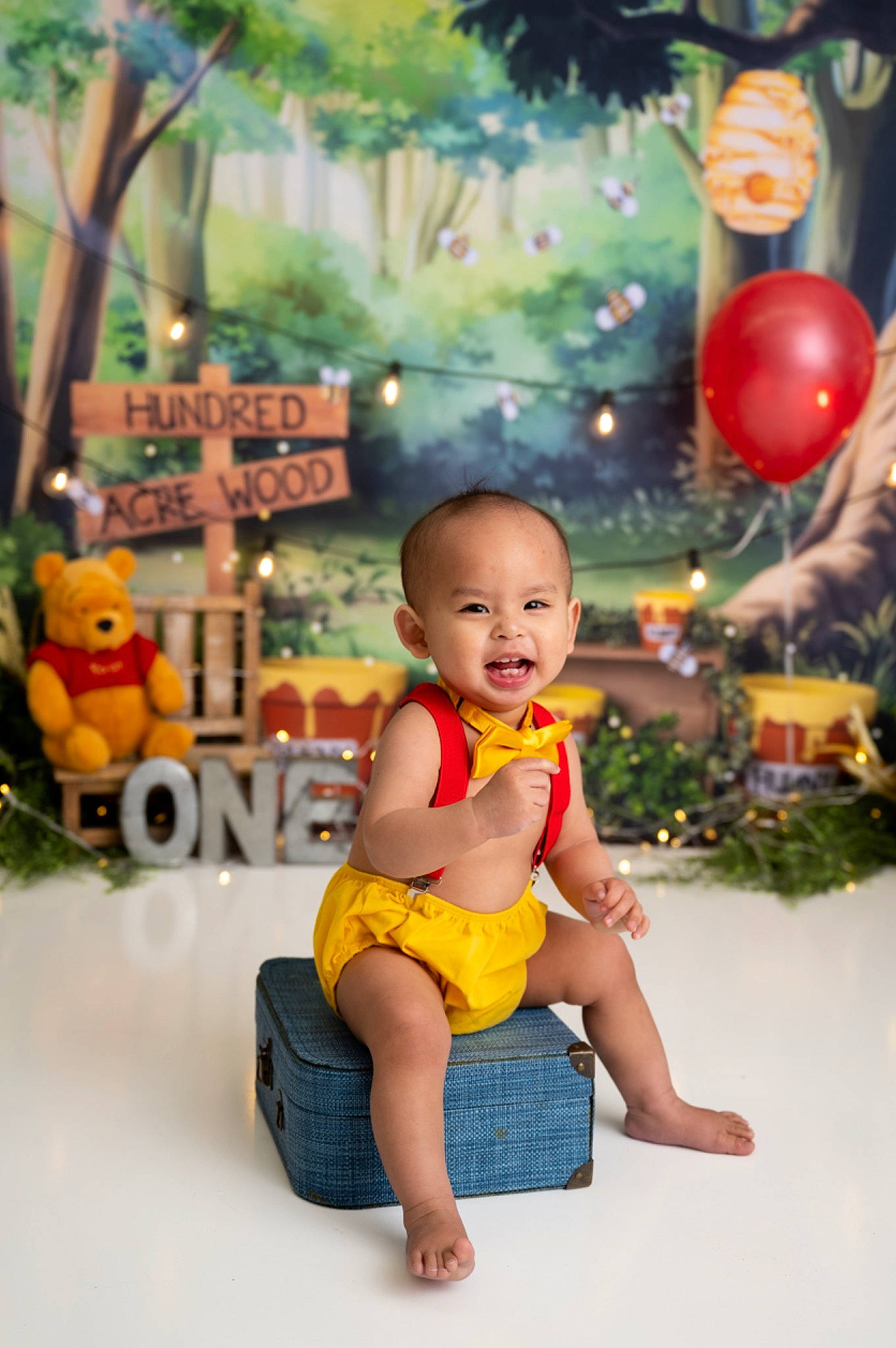 Jayden joined the competition — help win amazing prizes! baby, baby_toddler_clothing, balloon, child, christmas_ornament, event, foot, fun, happy, holiday_ornament, leisure, ornament, person, recreation, shorts, sitting, smile, thigh, toddler, toy