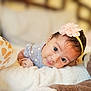 baby, blanket, bodypart, bonnet, clothing, cushion, face, finger, hand, happy, hat, head, homedecor, indoors, newborn, people, person, photography, portrait, smile