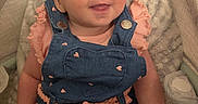 Laken joined the competition — help win amazing prizes! baby, child, denim, overalls, pink, clothing, smile, happy, face, eyes, infant, cute, sitting, blanket, soft, indoor, person, young, apparel, fashion