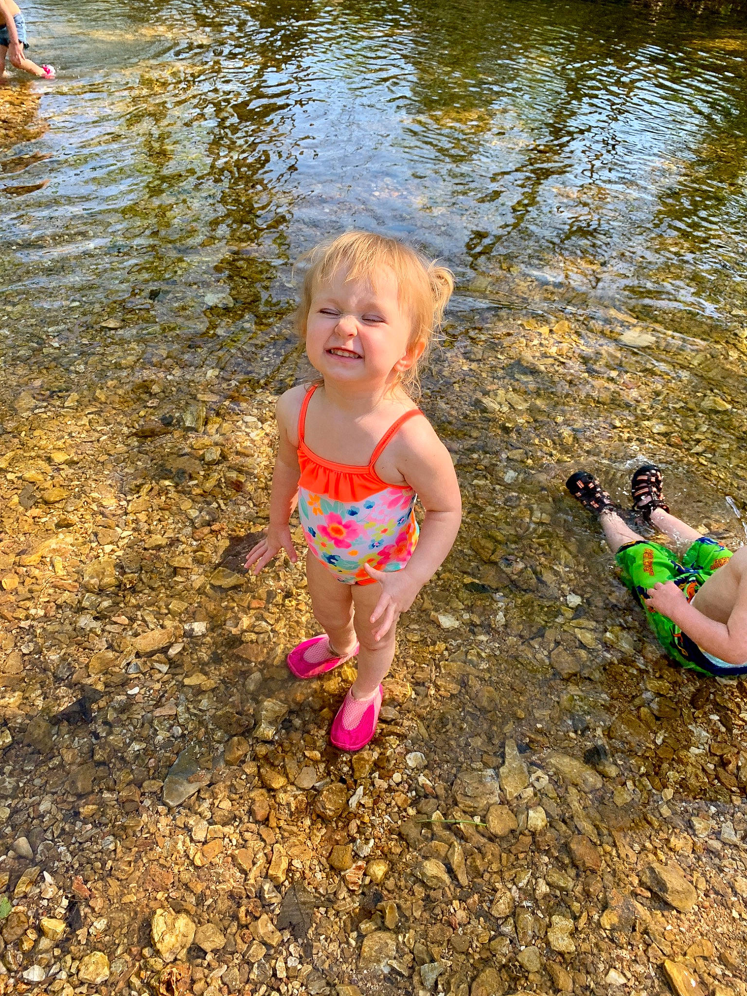 Talyia joined the competition — help win amazing prizes! bank, child, fun, joy, leisure, mud, person, play, recreation, river, smile, summer, toddler, tree, vacation, water