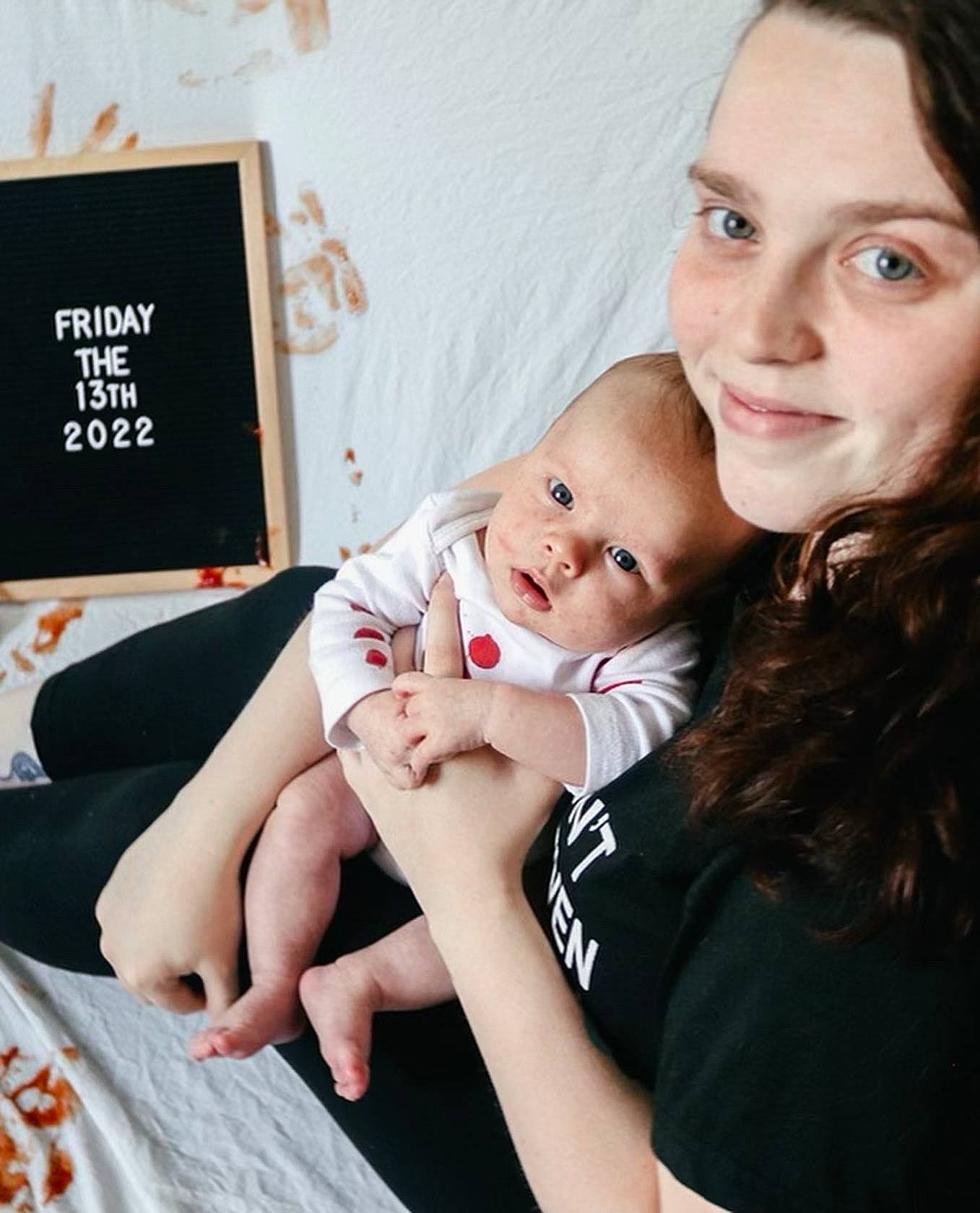 Oaklen is registered to the contest to win money with this photo: arm, baby, child, comfort, elbow, eye, eyelash, finger, gesture, happy, human_body, lip, nail, neck, person, shoulder, sitting, skin, thumb, toddler