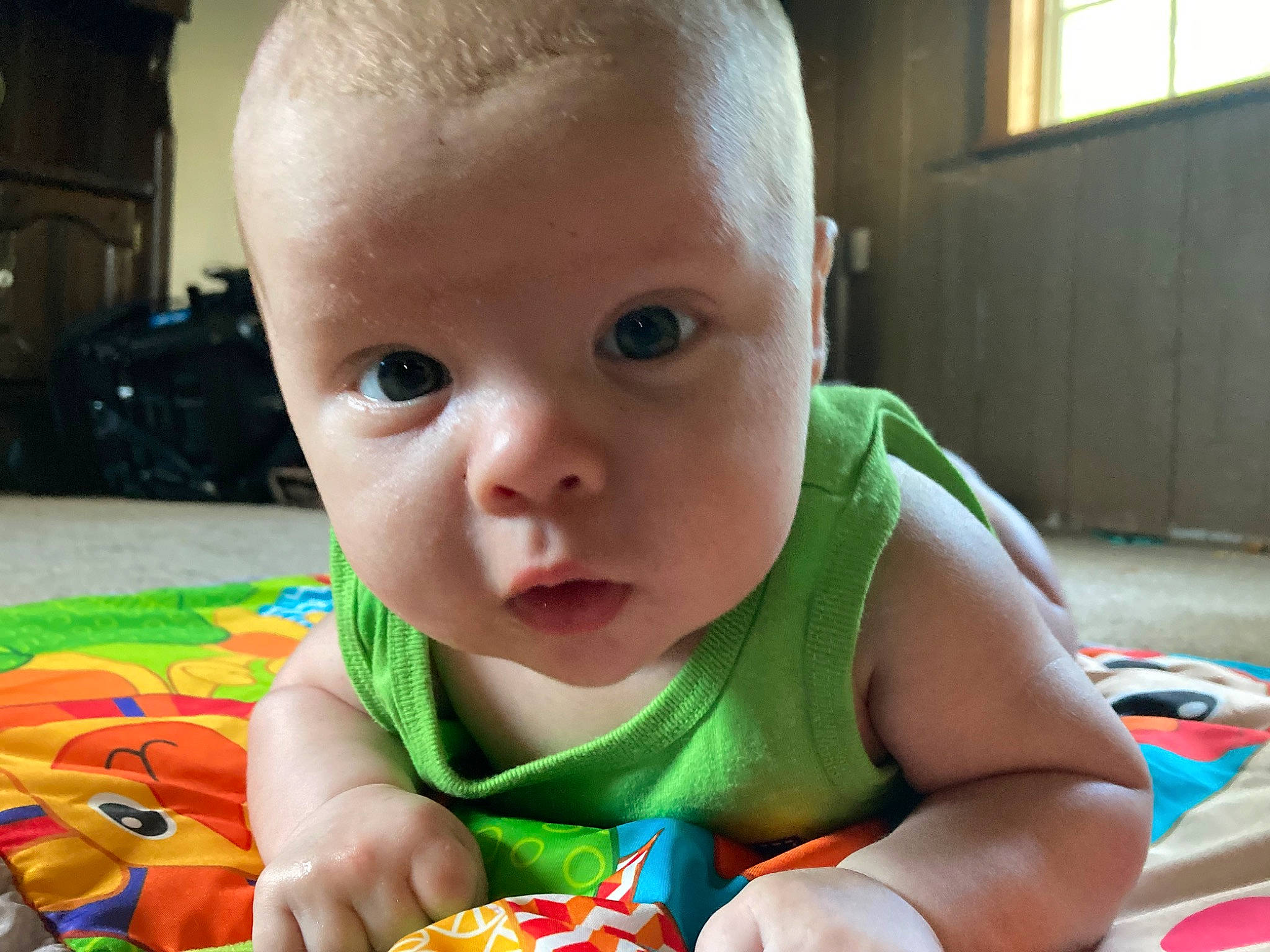 Oaklen joined the competition — help win amazing prizes! baby, baby_products, baby_toddler_clothing, cheek, child, dress, eyelash, face, facial_expression, flooring, fun, happy, iris, mouth, nose, people, person, skin, toddler, tummy_time