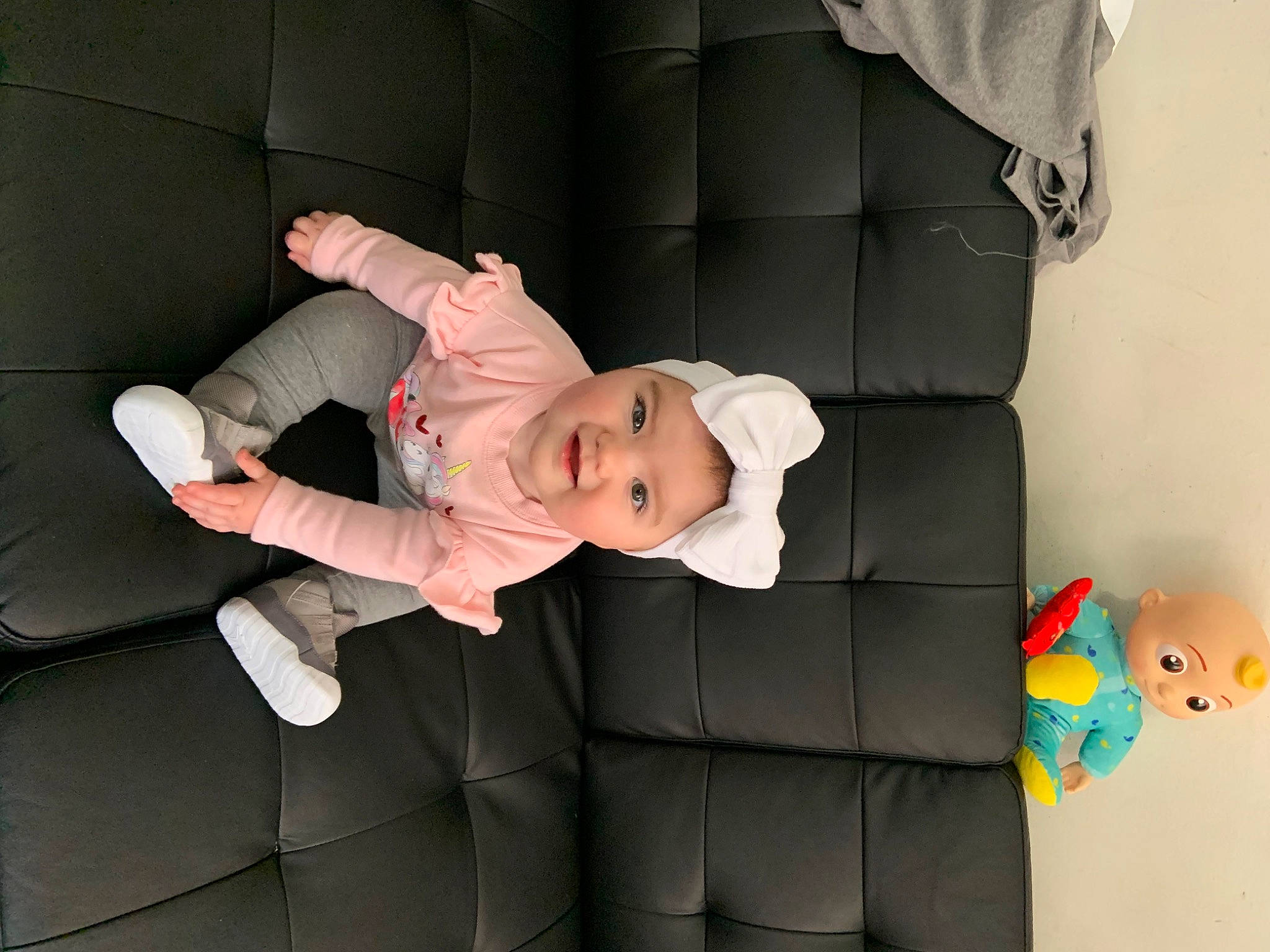 Arielle joined the competition — help win amazing prizes! arm, baby, baby_products, baby_toddler_clothing, child, comfort, flooring, headwear, lap, leg, linens, mammal, person, pink, product, room, sitting, sleeve, sock, toddler