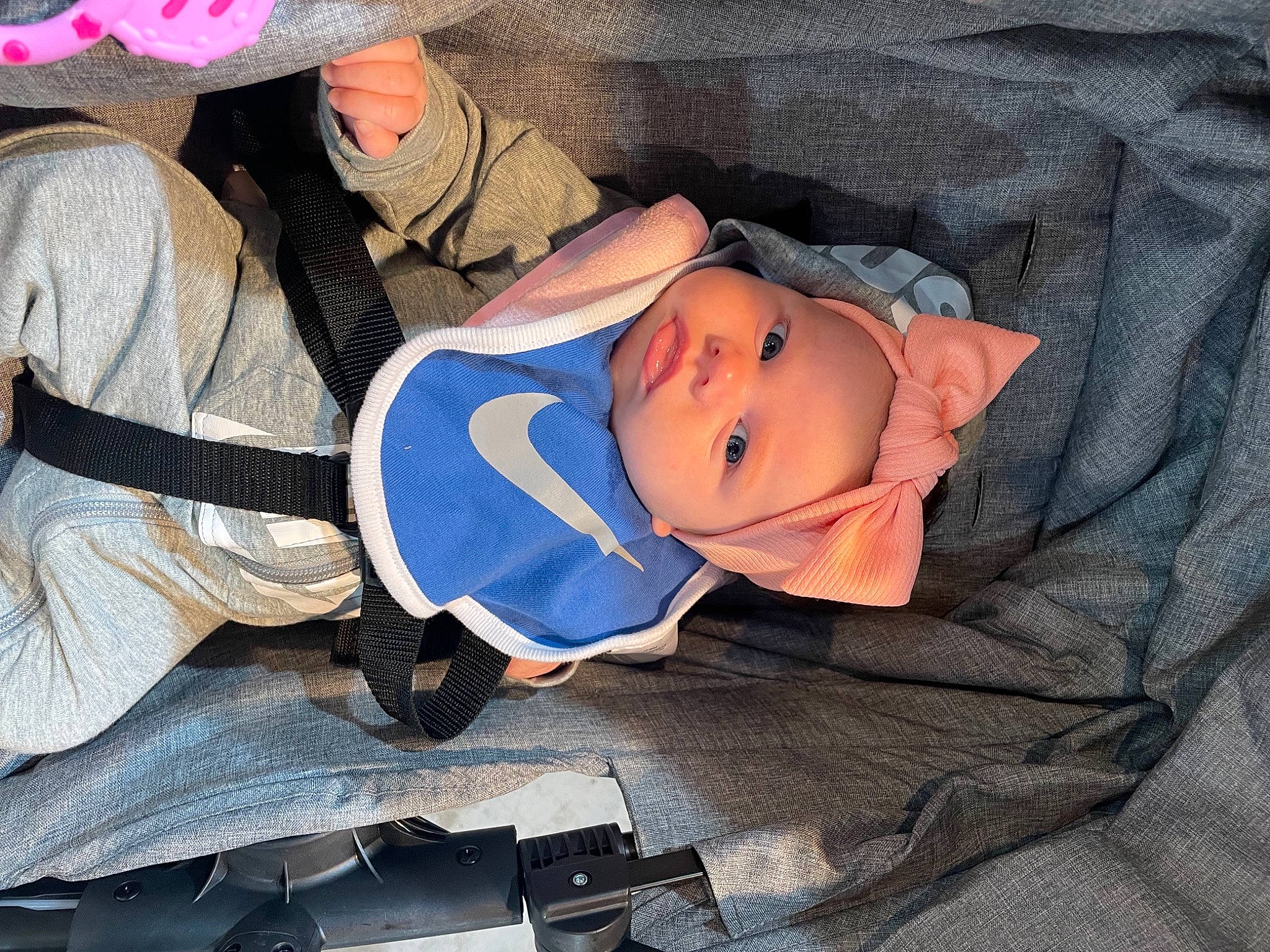 Adalena is registered to the contest to win money with this photo: baby, baby_carriage, baby_products, baby_toddler_clothing, cap, car_seat, carmine, child, comfort, eye, fashion_accessory, fun, hat, headgear, headwear, human_body, lap, person, room, sitting