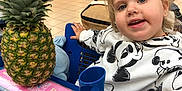 Joy participe au concours pour gagner de l'argent avec cette photo : child, toddler, shopping_cart, pineapple, mickey_mouse, sweater, blonde_hair, pigtails, mall, floor_tiles, blue_cart, smiling, person, indoor, retail, hand, bag, people, casual_clothing, shopping