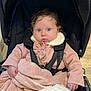 Hortense a rejoint le concours — aidez-le/la à gagner de superbes lots ! baby, child, stroller, blanket, pink_coat, fur_collar, blue_eyes, curly_hair, indoor, seated, hands, warm_clothing, infant, cute, portrait, soft_texture, comfort, bundle, expression, curiosity