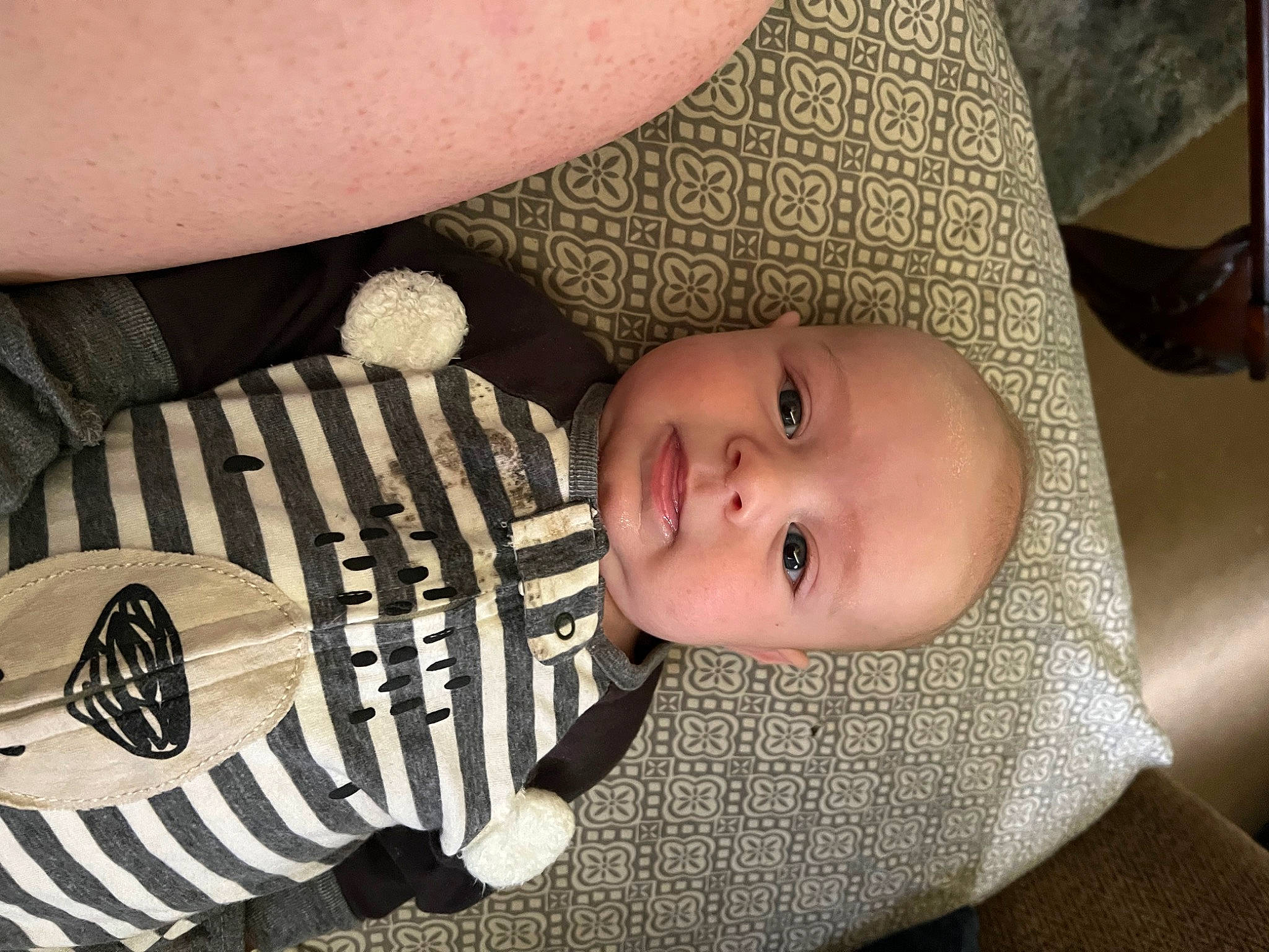 Eziah is registered to the contest to win money with this photo: arm, baby, baby_toddler_clothing, cheek, comfort, eye, finger, hand, head, headgear, human_body, leg, lip, mammal, organ, person, product, skin, sleeve, toddler