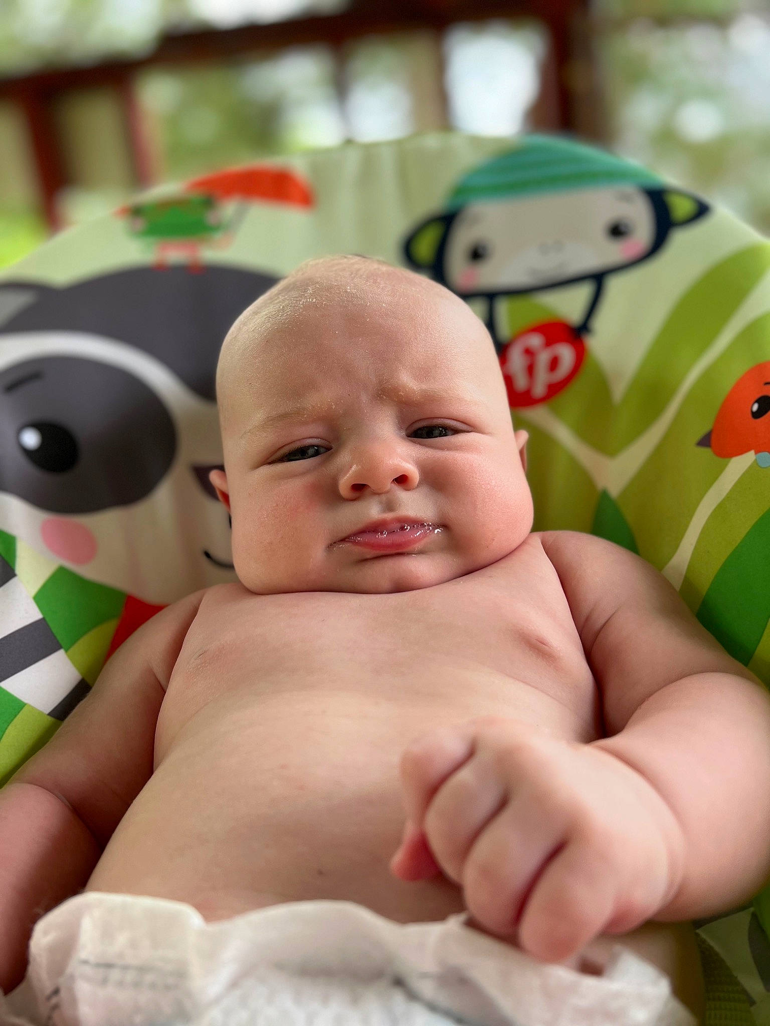 Eziah joined the competition — help win amazing prizes! arm, baby, cheek, comfort, facial_expression, finger, fun, green, happy, iris, mouth, nail, nose, person, photograph, skin, smile, thumb, toddler, toy