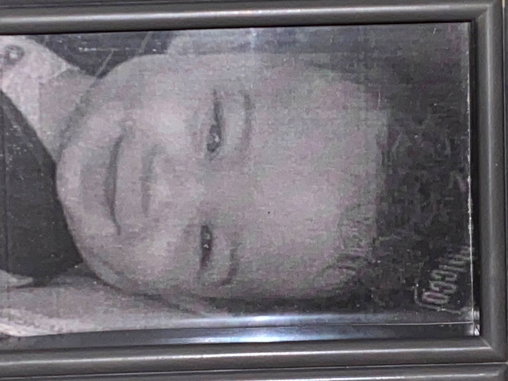 Chance is registered to the contest to win money with this photo: art, artifact, artwork, auto_part, carving, eye, eyelash, font, glass, head, joy, monochrome, monochrome_photography, person, picture_frame, rectangle, relief, sculpture, smile, visual_arts