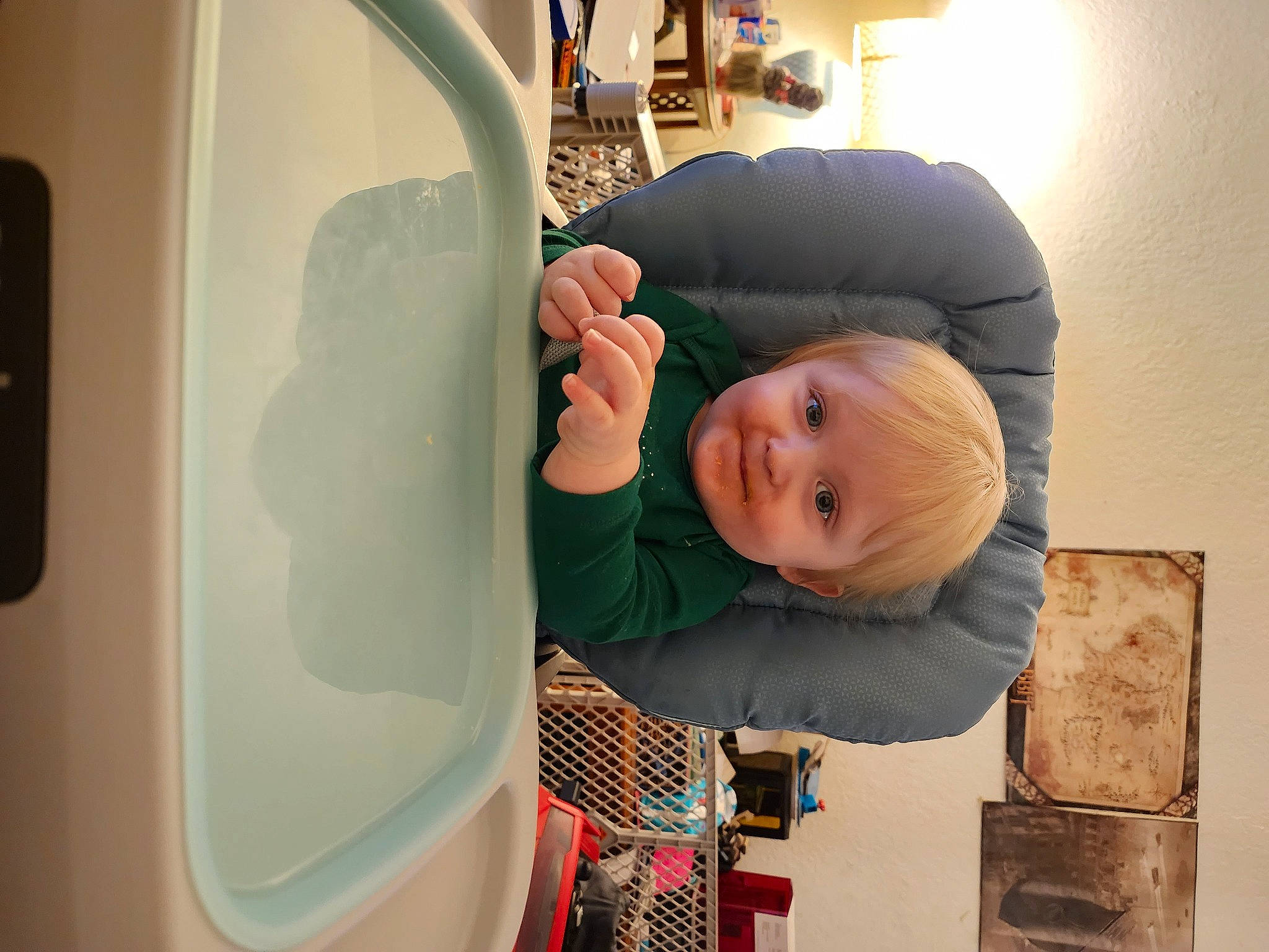 Leon is registered to the contest to win money with this photo: air_travel, airline, auto_part, automotive_exterior, automotive_window_part, baby, baby_products, car_seat, child, comfort, family_car, finger, fun, gadget, person, room, sitting, standing, t_shirt, toddler