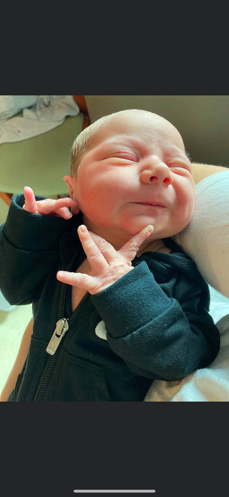 Jax is registered to the contest to win money with this photo: baby, baby_toddler_clothing, cheek, comfort, eye, eyelash, finger, gesture, happy, joint, lip, mouth, nail, neck, nose, person, sleeve, smile, thumb, toddler