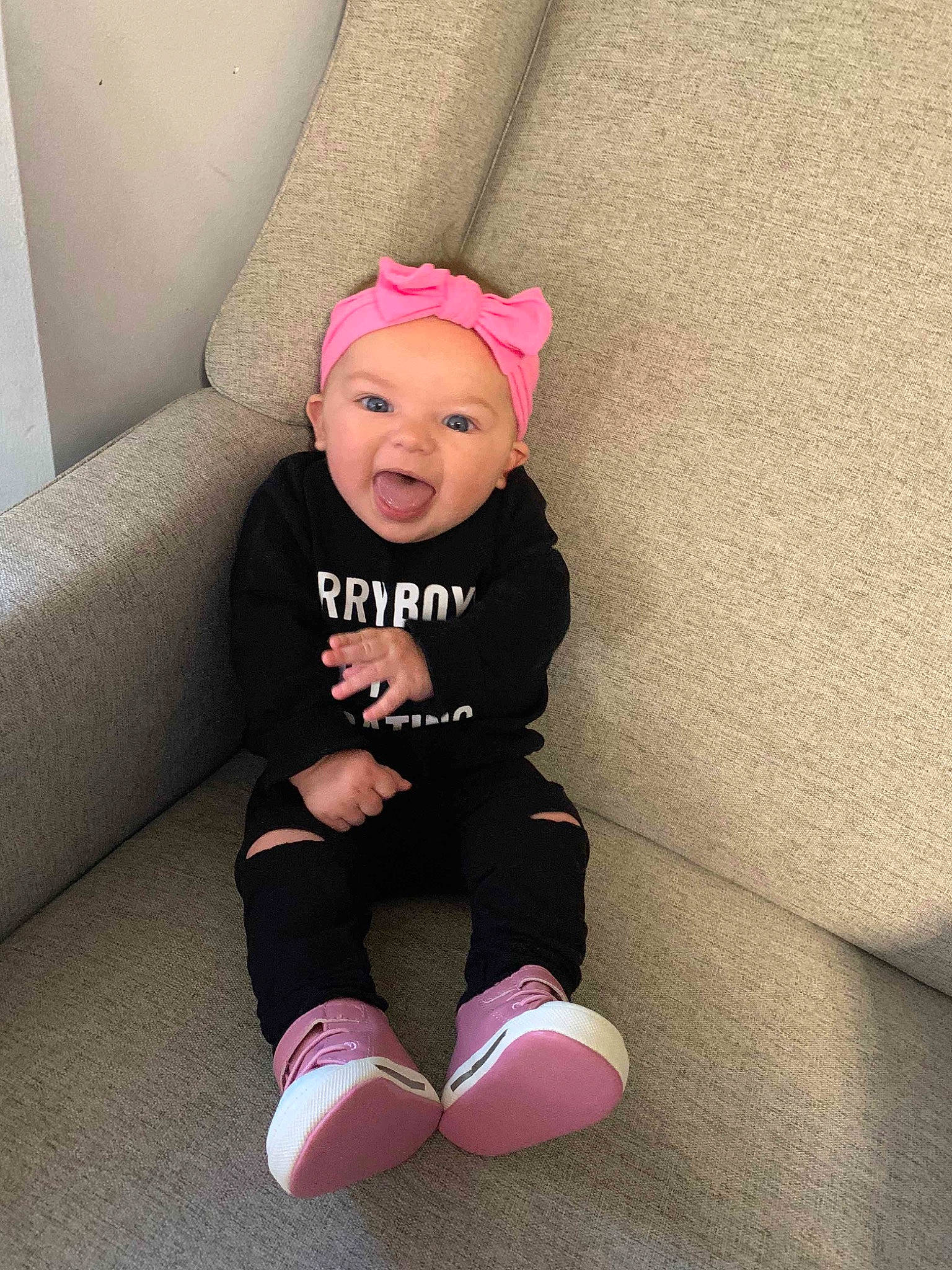 Kinlee is registered to the contest to win money with this photo: baby, baby_toddler_clothing, cap, child, clothing, comfort, costume_hat, flooring, fun, headgear, headwear, human_leg, knee, magenta, person, pink, sleeve, smile, sock, sportswear