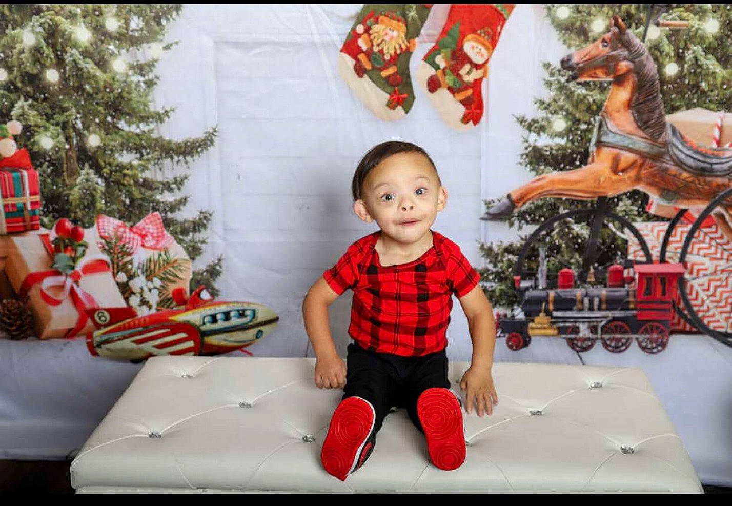 Landyn is registered to the contest to win money with this photo: art, carmine, christmas, christmas_decoration, christmas_eve, christmas_ornament, doll, event, fictional_character, happy, holiday, holiday_ornament, interior_design, lap, ornament, person, red, sitting, sleeve, toy