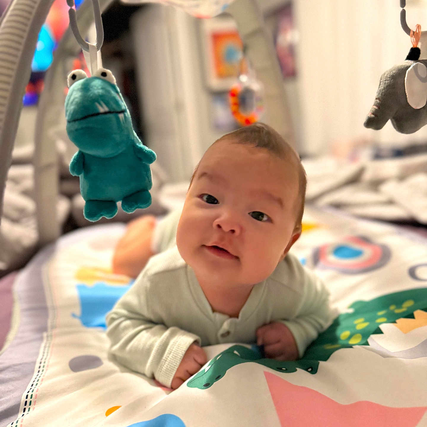 Elijah is registered to the contest to win money with this photo: architecture, baby, bed, blanket, bodypart, building, crib, face, finger, furniture, hand, happy, head, hospital, infantbed, newborn, person, photography, portrait, toy