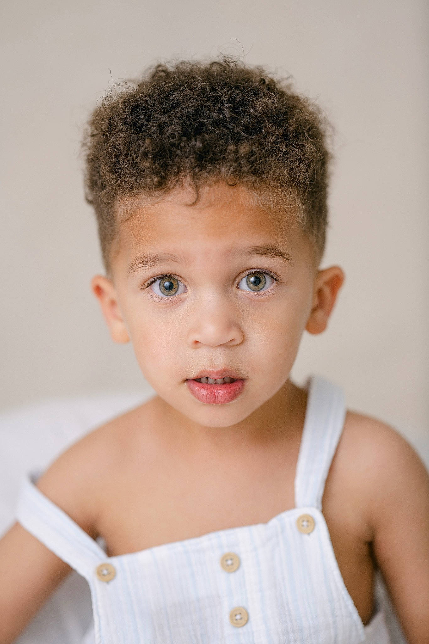 Norman is registered to the contest to win money with this photo: baby_toddler_clothing, cheek, chest, child, chin, elbow, eyebrow, eyelash, face, flash_photography, happy, iris, lip, neck, nose, people, person, skin, sleeve, toddler