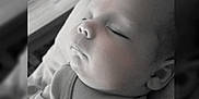 ézekiel participe au concours pour gagner de l'argent avec cette photo : baby, black_and_white, calm, child, closeup, clothing, cozy, cute, face, head, indoors, infant, newborn, peaceful, person, portrait, resting, sleeping, soft_light, toddler