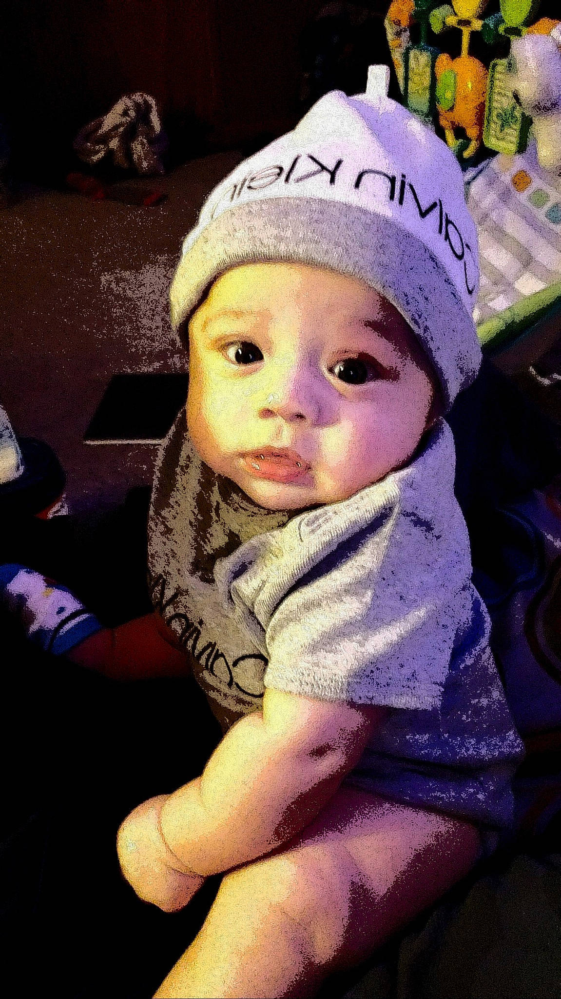 Achilles joined the competition — help win amazing prizes! baby, baby_toddler_clothing, beanie, cap, cheek, child, cool, fashion_accessory, fur, happy, headgear, headwear, knit_cap, lip, nose, person, purple, sitting, skin, sleeve