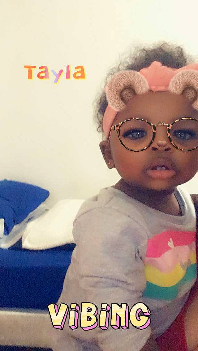 Tayla is registered to the contest to win money with this photo: cheek, child, cool, ear, eyewear, forehead, glasses, head, nose, person, photo_caption, photography, smile, toddler, vision_care