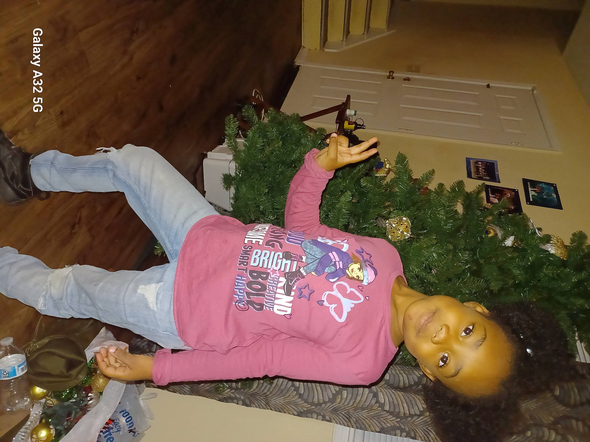 Hailey is registered to the contest to win money with this photo: event, happy, holiday, houseplant, joy, lap, person, plant, room, sleeve, tableware, thigh, toy