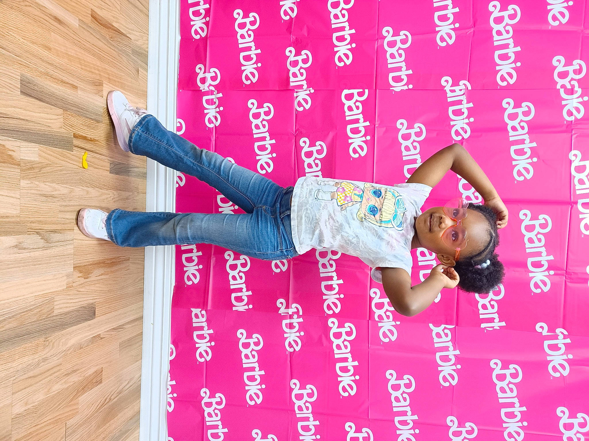 Hailey is registered to the contest to win money with this photo: arm, carmine, event, flooring, font, hair, hand, happy, hardwood, human_body, human_leg, magenta, nail, person, pink, plant, red, smile, thigh, wood