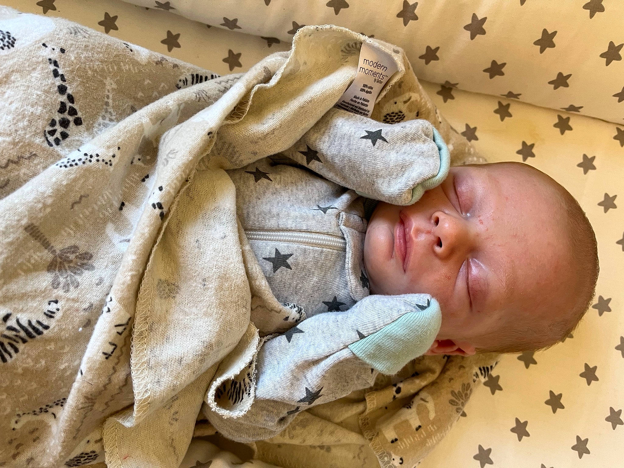 Malakai is registered to the contest to win money with this photo: baby, baby_products, baby_sleeping, baby_toddler_clothing, bedding, bedtime, beige, child, comfort, fur, hand, linens, nap, pattern, person, skin, sleep, toddler, wood