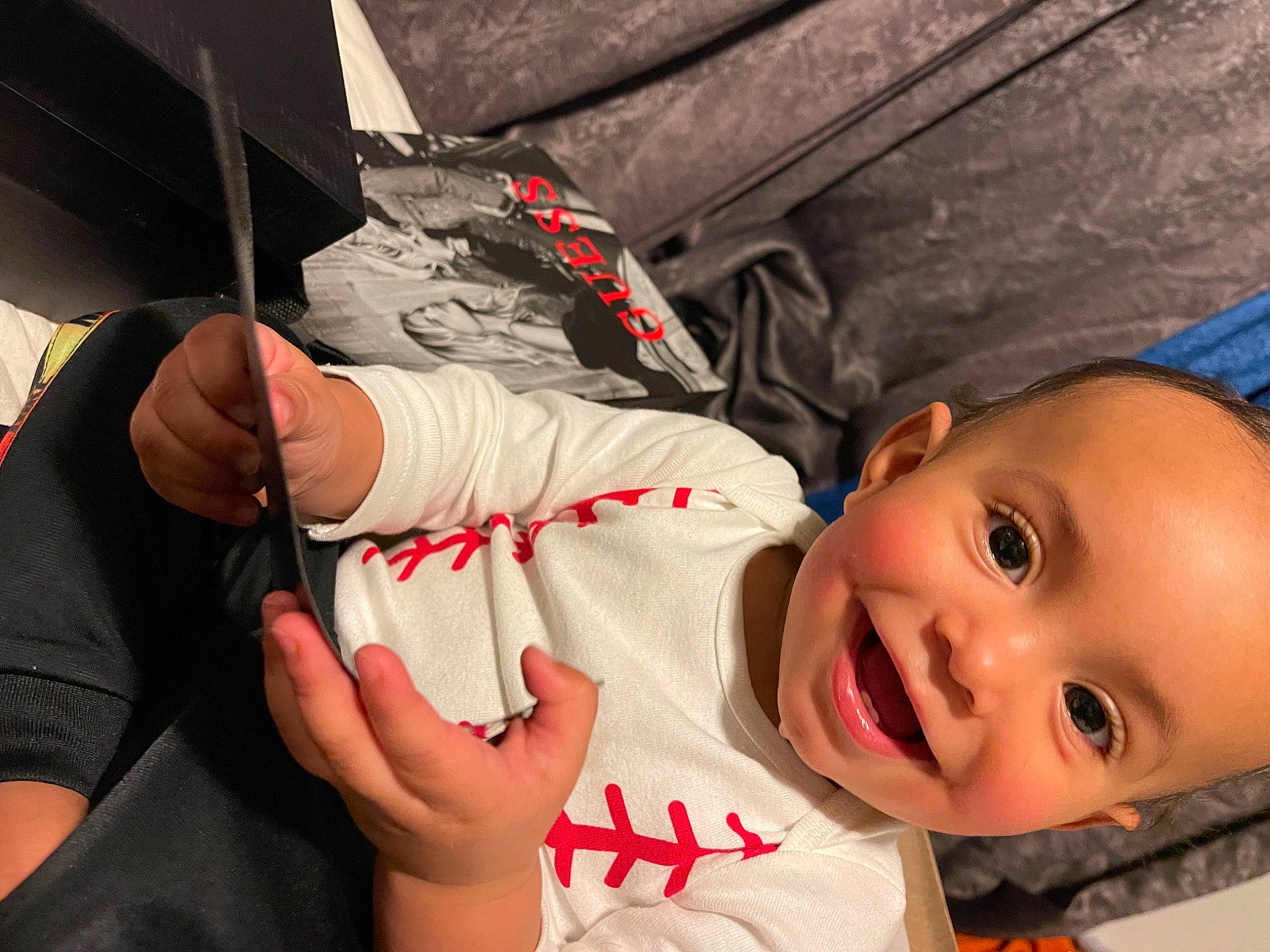 Phillip is registered to the contest to win money with this photo: baby, baby_laughing, baby_products, baby_toddler_clothing, cheek, child, comfort, finger, glove, iris, joy, laugh, leather, lip, nail, person, thumb, toddler, tongue, tooth