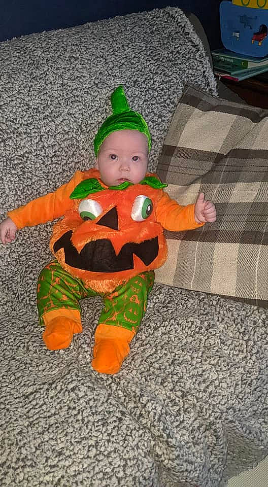 Lawson joined the competition — help win amazing prizes! baby_toddler_clothing, calabaza, costume, costume_hat, cucurbita, doll, fictional_character, gourd, hat, headwear, holiday, jack_o_lantern, orange, person, pumpkin, stuffed_toy, textile, toddler, toy, trick_or_treat