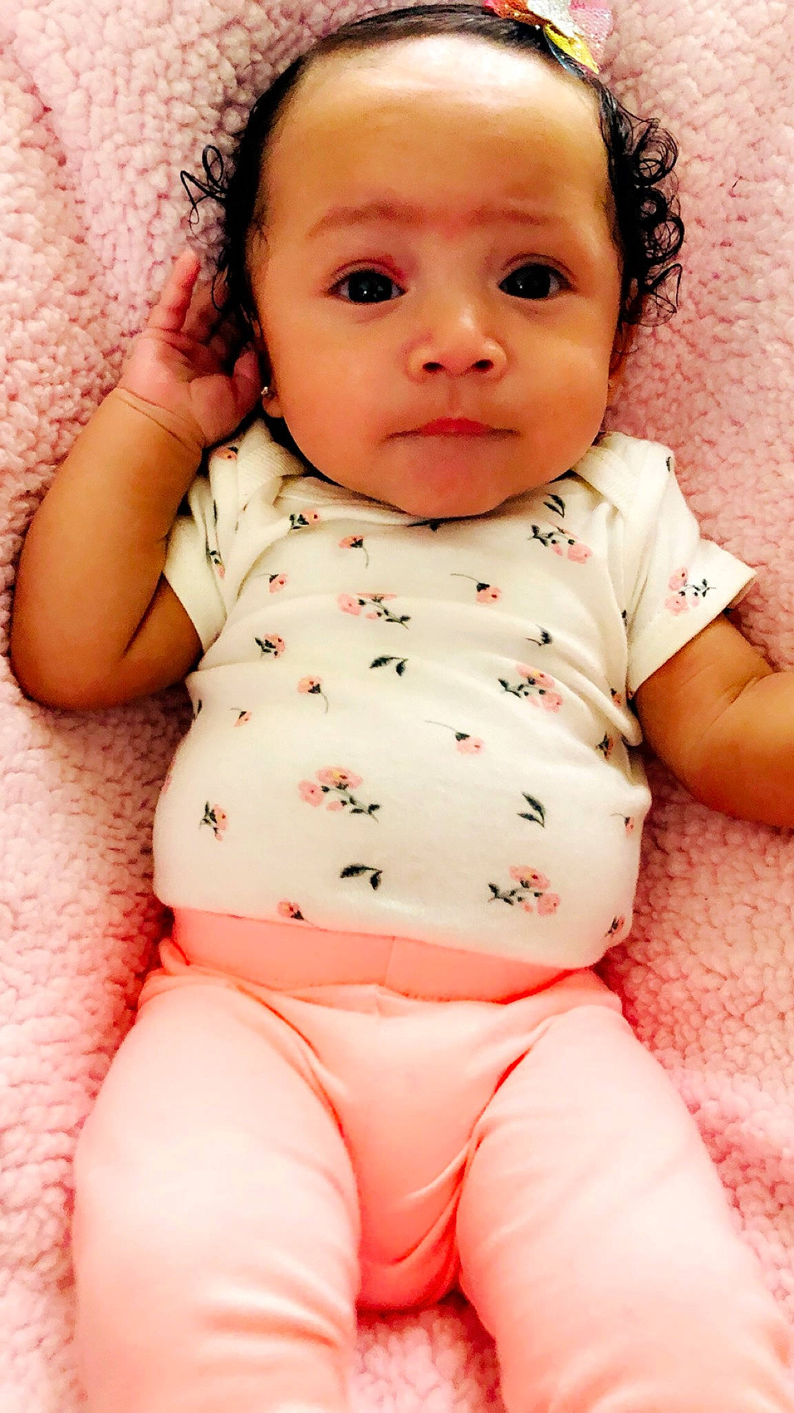 Keziah is registered to the contest to win money with this photo: baby, baby_making_funny_faces, baby_products, baby_toddler_clothing, cheek, child, face, head, lip, mouth, nose, person, pink, skin, smile, toddler