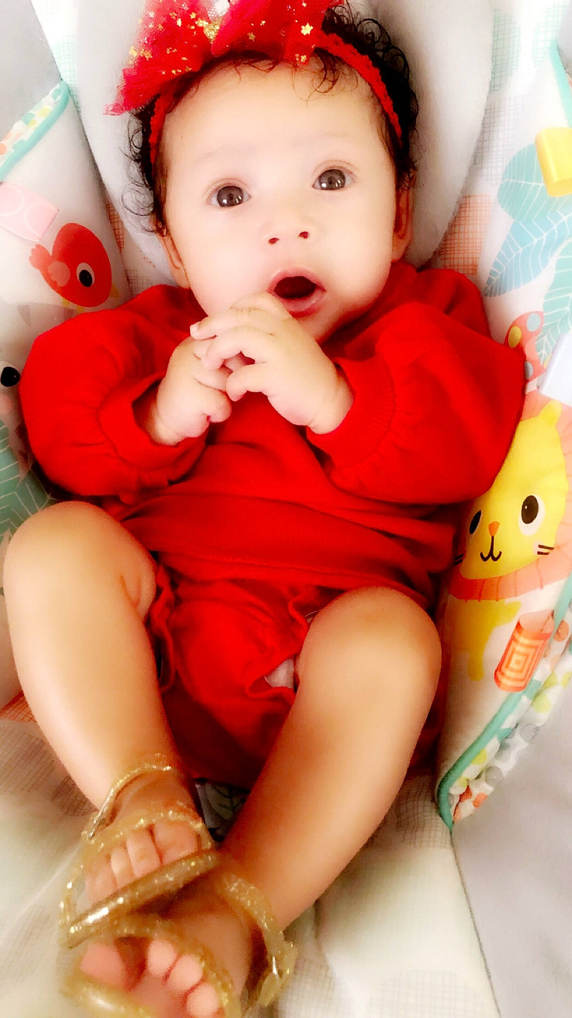 Keziah is registered to the contest to win money with this photo: baby, beauty, cheek, child, finger, leg, lip, mouth, nose, person, pink, red, skin, surprise, toddler