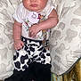 Willow is registered to the contest to win money with this photo: baby, black_and_white_pants, blanket, child, clothing, comfort, cute, elephant_pattern, floral_shirt, flower, headband, indoors, infant, pacifier, peaceful, pillow, resting, sleeping, soft, toddler