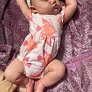 Willow joined the competition — help win amazing prizes! arms, baby, blanket, child, cozy, cute, feet, fish_pattern, hands, headband, indoors, infant, legs, portrait, purple, resting, romper, sleeping, soft_texture, toddler