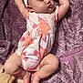 arms, baby, blanket, child, cozy, cute, feet, fish_pattern, hands, headband, indoors, infant, legs, portrait, purple, resting, romper, sleeping, soft_texture, toddler