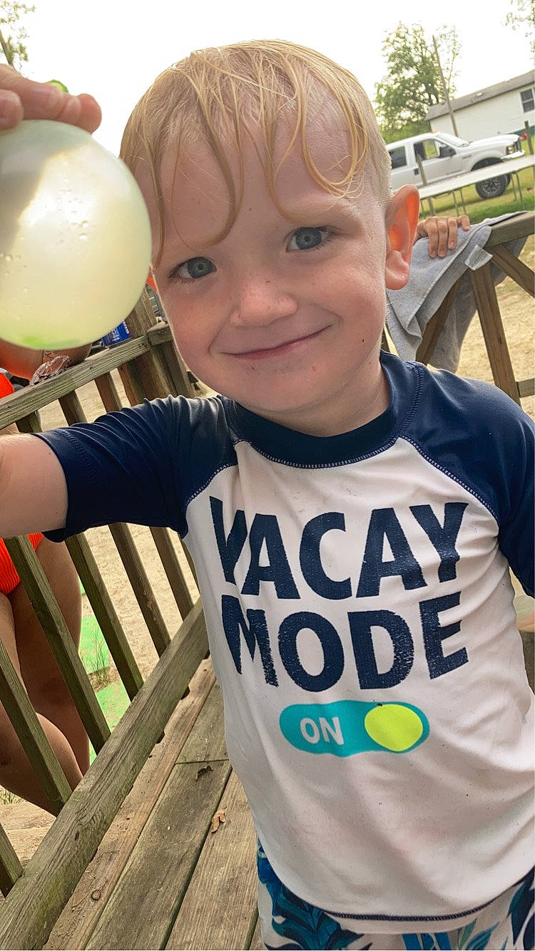 Lincoln joined the competition — help win amazing prizes! balloon, child, community, cool, electric_blue, event, fun, gesture, green, happy, joy, leisure, natural_environment, party_supply, person, recreation, sleeve, smile, t_shirt, toddler