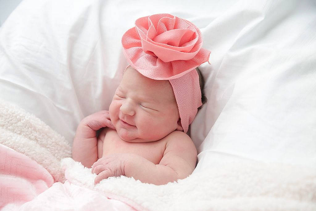 Ana joined the competition — help win amazing prizes! baby, baby_sleeping, baby_toddler_clothing, cap, child, comfort, face, fashion_accessory, flower, hair_accessory, happy, headgear, headpiece, linens, peach, person, petal, pink, rose, skin