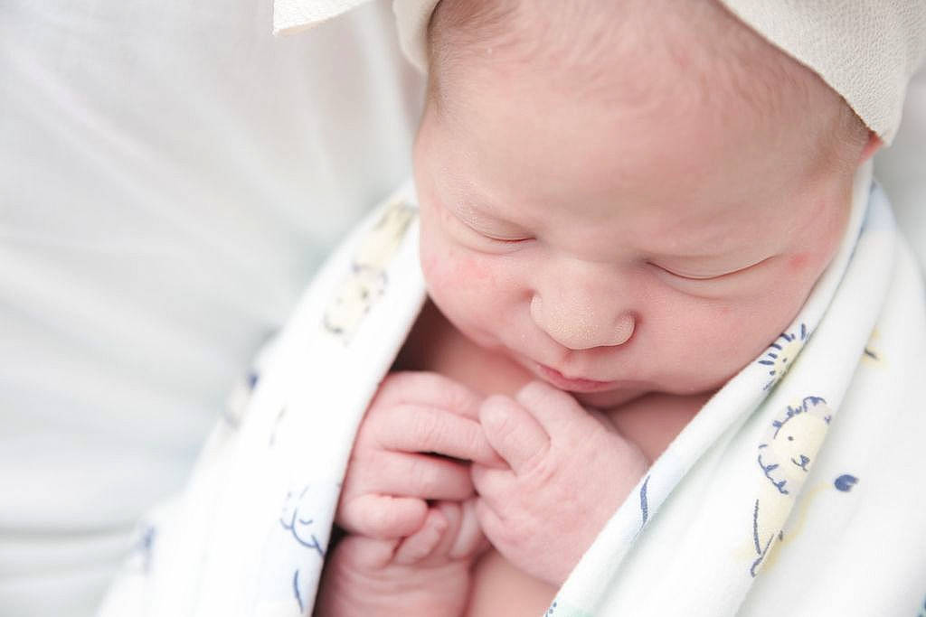 Liana is registered to the contest to win money with this photo: baby, baby_toddler_clothing, cheek, child, chin, comfort, eyebrow, finger, gesture, hand, happy, iris, lip, mammal, mouth, nail, nose, person, skin, thumb