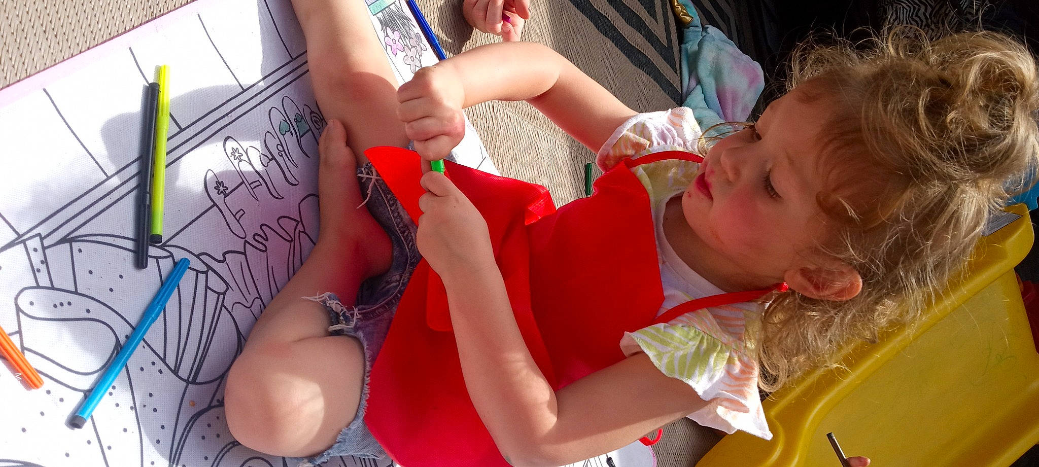 Maddison is registered to the contest to win money with this photo: arm, calf, chest, child, elbow, finger, fun, gesture, hand, happy, human_leg, knee, leg, mouth, nail, person, skin, thigh, thumb, toddler