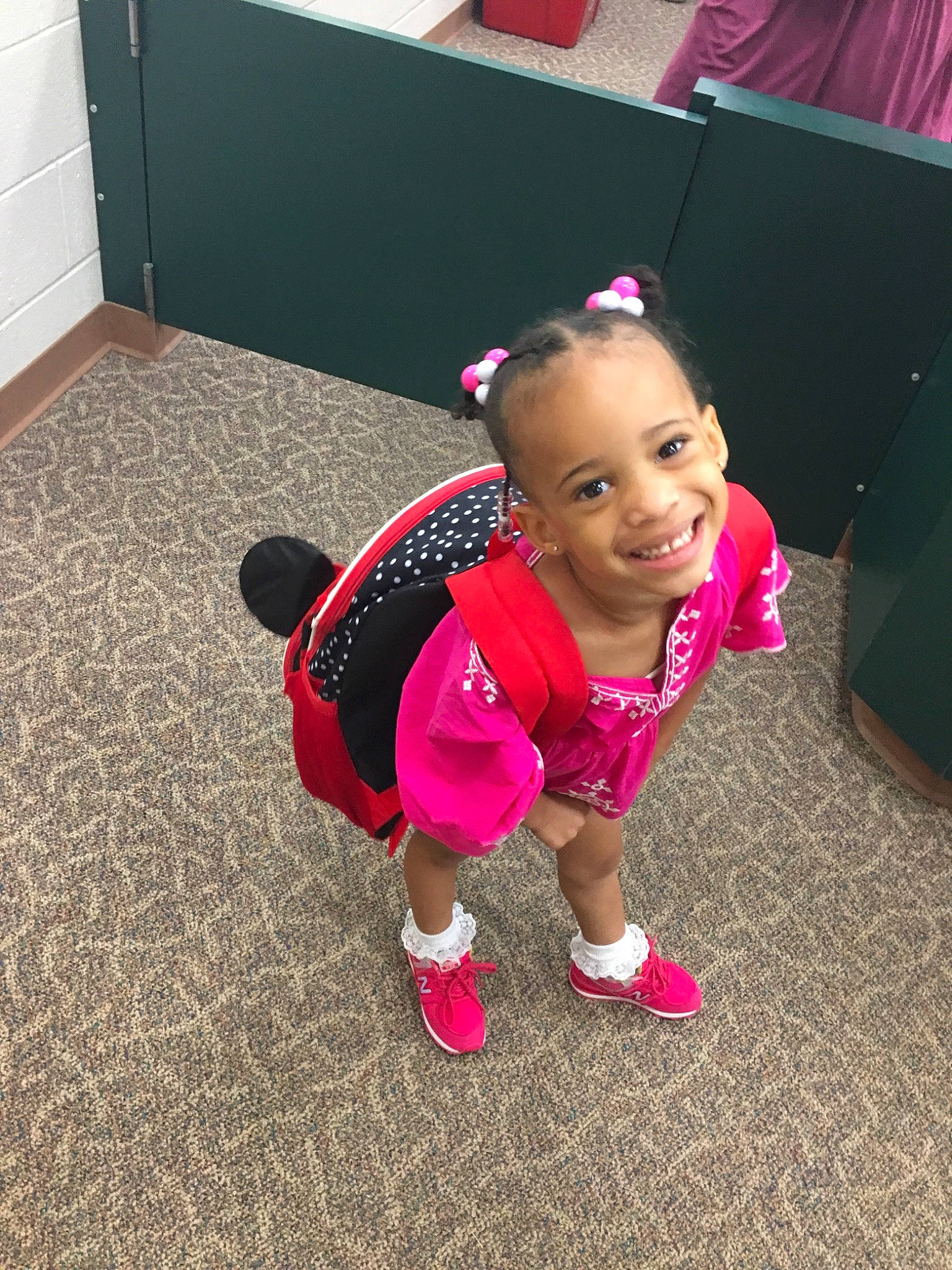 Sloan is registered to the contest to win money with this photo: child, face, floor, flooring, footwear, fun, gadget, hairstyle, happy, head, joy, party, person, photography, pink, plant, play, skin, smile, technology