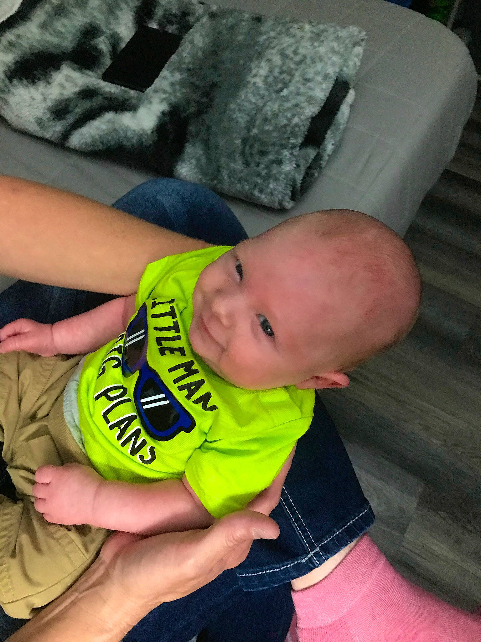 Kashton is registered to the contest to win money with this photo: baby, baby_toddler_clothing, cheek, child, comfort, elbow, finger, fun, happy, head, human_leg, knee, nail, person, sitting, sleeve, smile, thigh, thumb, toddler