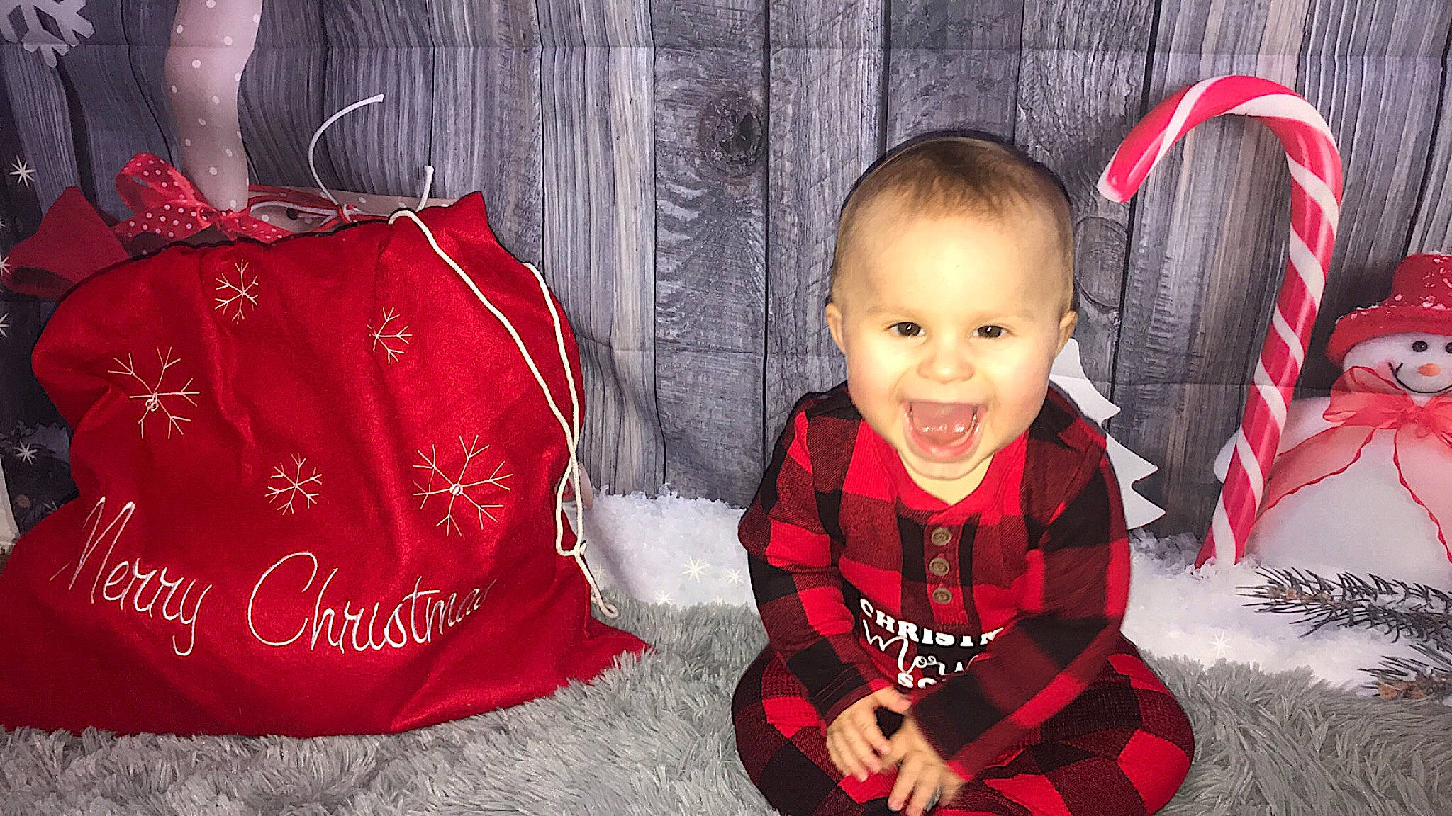 Brayden joined the competition — help win amazing prizes! baby, baby_laughing, baby_toddler_clothing, carmine, child, christmas, flag, holiday, laugh, pattern, person, red, shoulder_bag, sleeve, toddler