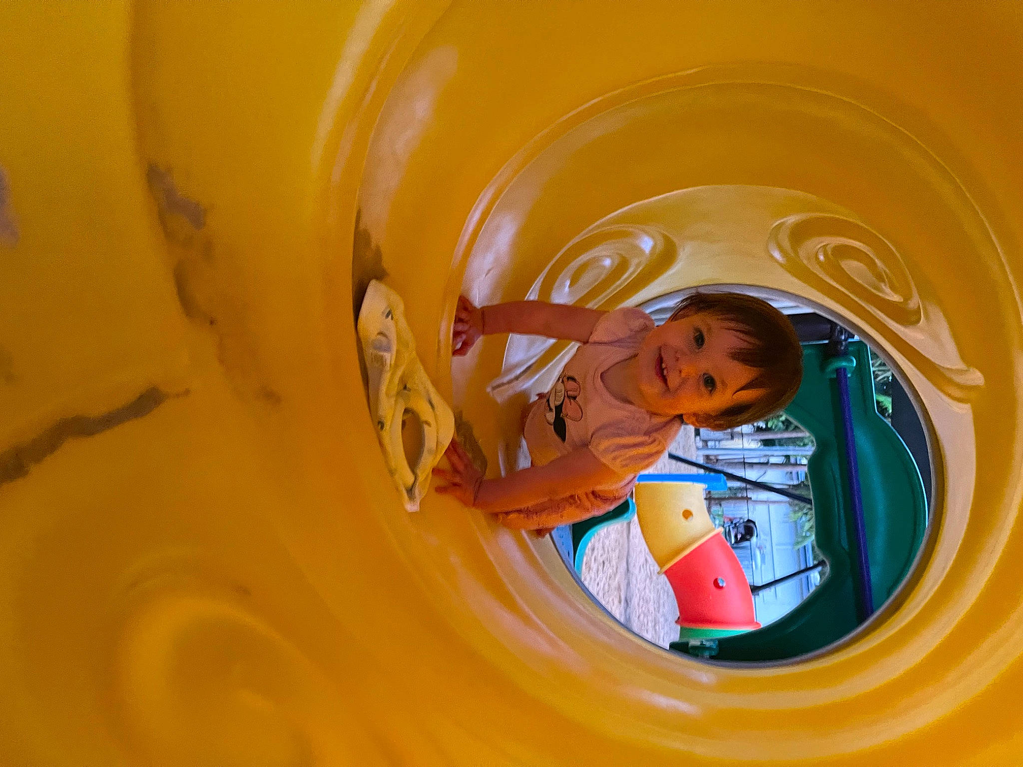 Kyah is registered to the contest to win money with this photo: automotive_design, automotive_lighting, automotive_wheel_system, baby, child, chute, circle, electric_blue, fun, glass, inflatable, joy, leisure, orange, outdoor_play_equipment, person, personal_protective_equipment, plastic, playground, recreation