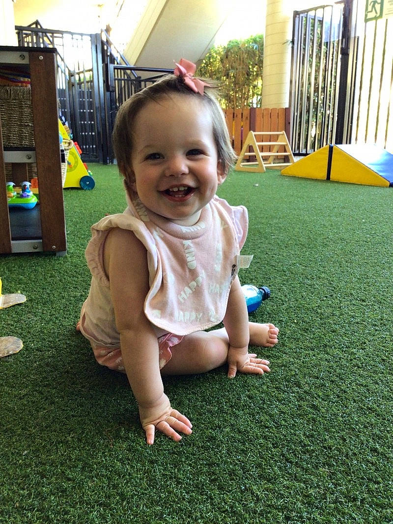 Kyah is registered to the contest to win money with this photo: baby, baby_toddler_clothing, barefoot, child, flooring, foot, fun, grass, happy, joy, lawn, leaf, leisure, people_in_nature, person, plant, play, recreation, smile, summer