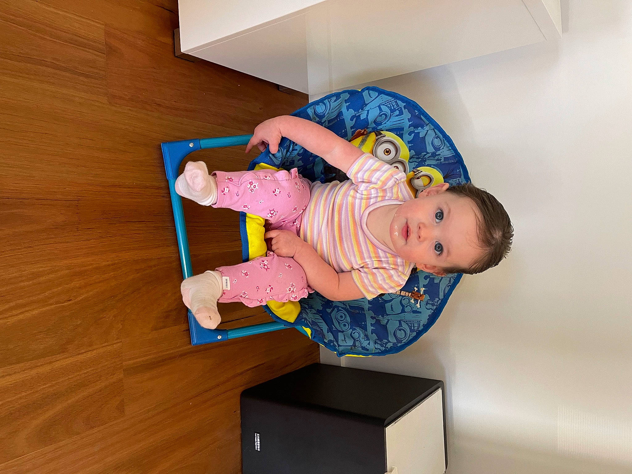 Kyah joined the competition — help win amazing prizes! baby, baby_products, baby_safety, baby_toddler_clothing, child, comfort, flooring, fun, hardwood, human_body, magenta, person, room, sitting, sock, t_shirt, toddler, varnish, wood, wood_flooring